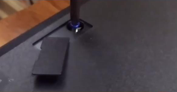 Remove the ps3 screw with a screwdriver